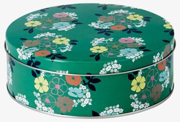 Bild av grön plåtburk med blommönster och blank finish