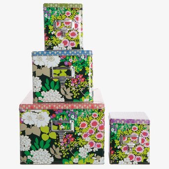 Foto av färgglada blommiga förvaringsboxar med handtag