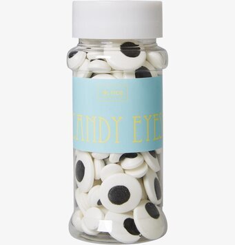 Bild av bakdekorationer i burk med färgglad etikett