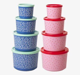 Bild av sex förvaringslådor med blommönster och färgtema