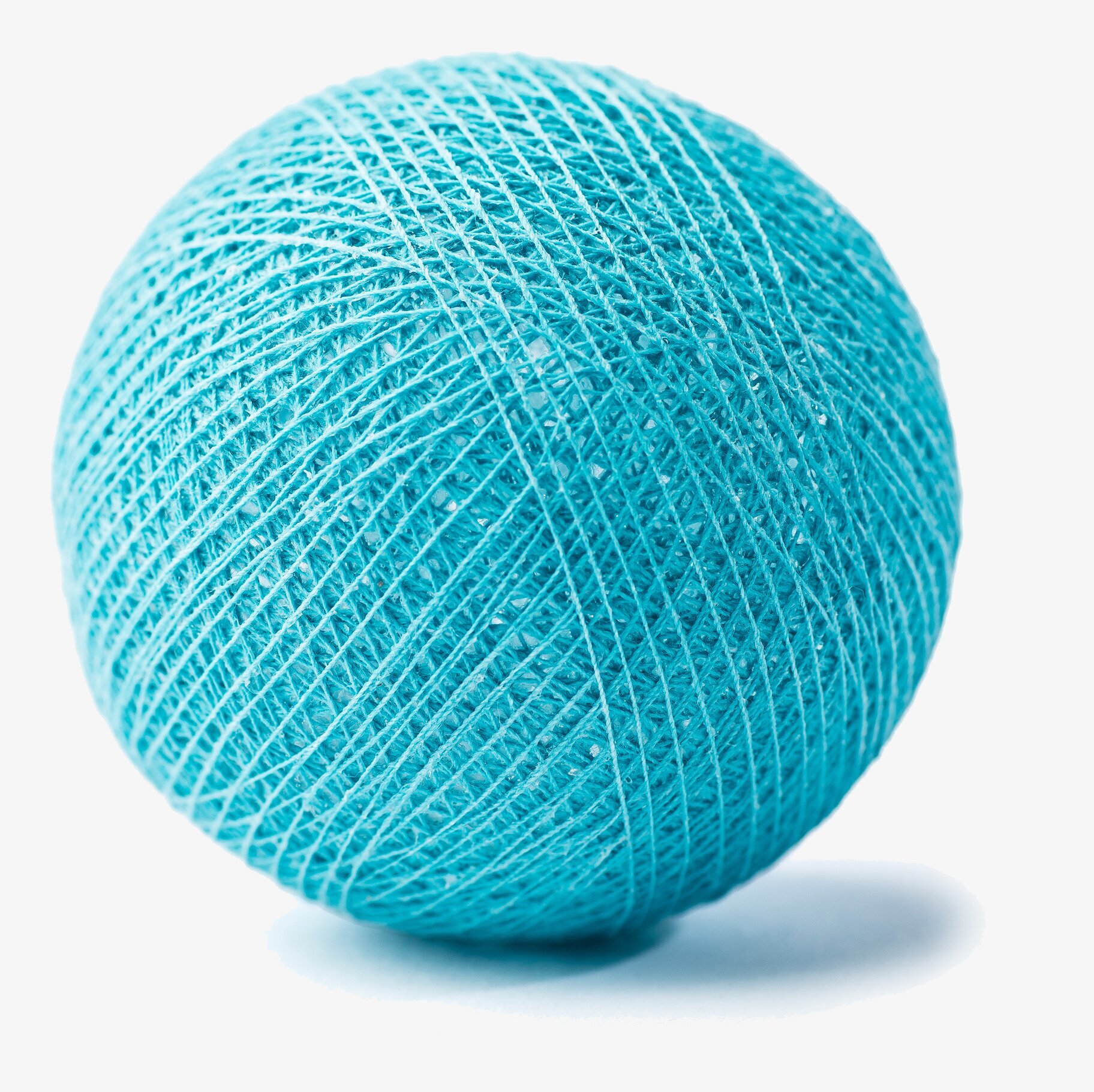 Bild av detaljerad turkos boll med livlig färg och textur