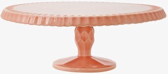 Foto av elegant tårtfat i korallfärg med räfflat mönster