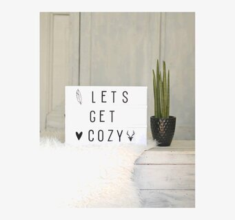 Bild av harmonisk scen med ljusbox och hemtrevlig känsla