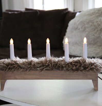 Foto av elegant ljusstake i hemtrevlig inomhusmiljö