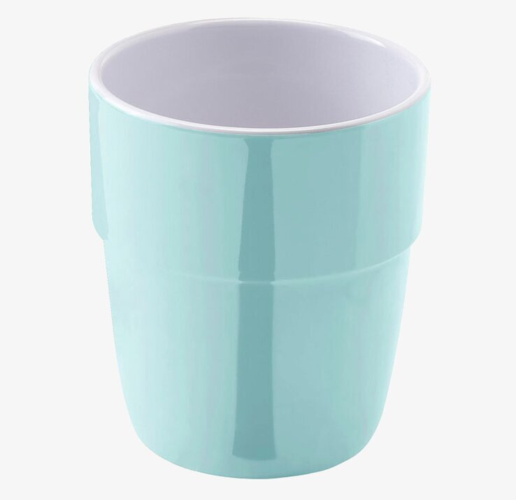Bild av stilren och funktionell turkos mugg för vardagen