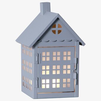 Bild på stilren metallhusformad lykta med mjukt ljus