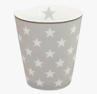 Bild av ljusgrå mugg med stjärnmönster och stilren design