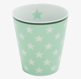 Bild av mintgrön keramikmugg med stjärnmönster