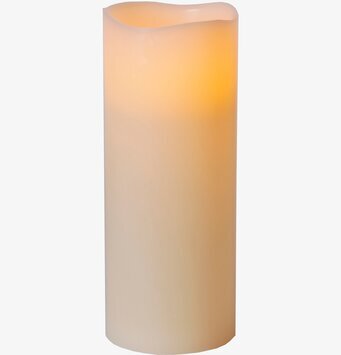 Bild av elfenbensvitt vaxljus med realistisk design