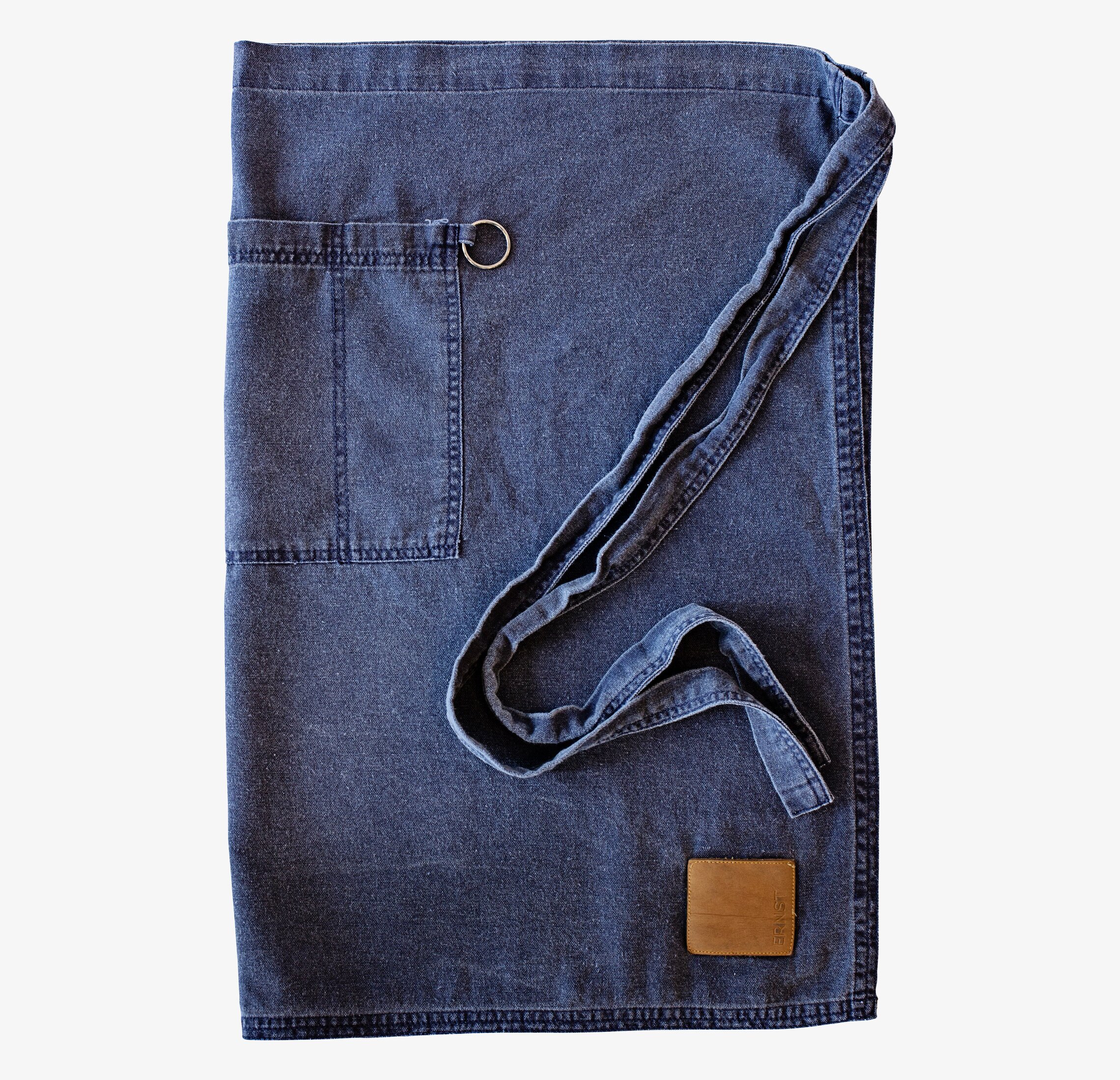 Bild av stilrent och funktionellt förkläde med detaljer