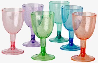 Bild av färgglada plastglas i olika nyanser och glitter