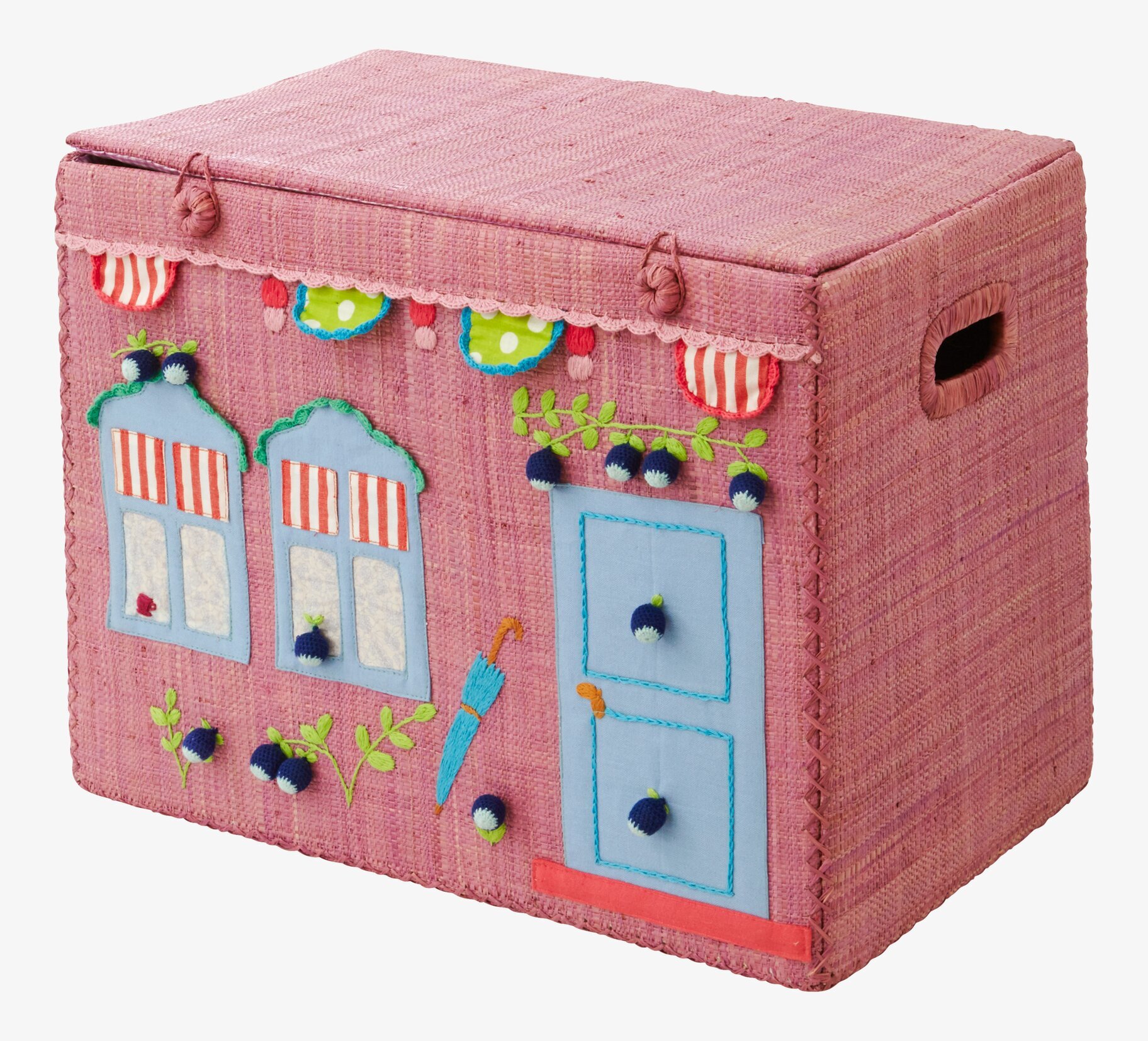 Bild av unik förvaringskorg med husmotiv och detaljer