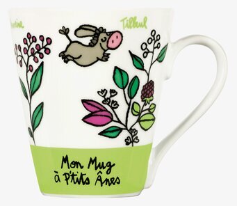 Bild av keramikmugg med lekfullt åsnemotiv och växter