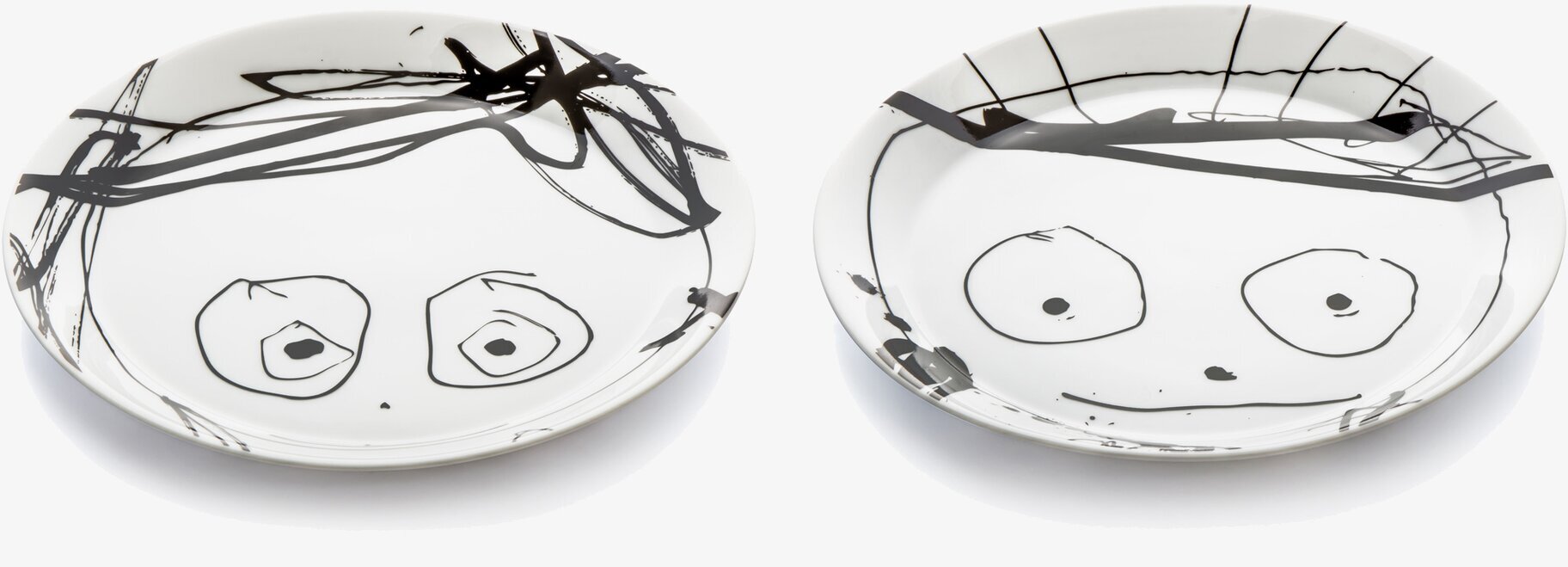 Bild av moderna tallrikar med konstnärligt mönster