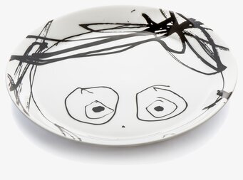 Bild av unik tallrik med konstnärliga inslag och design