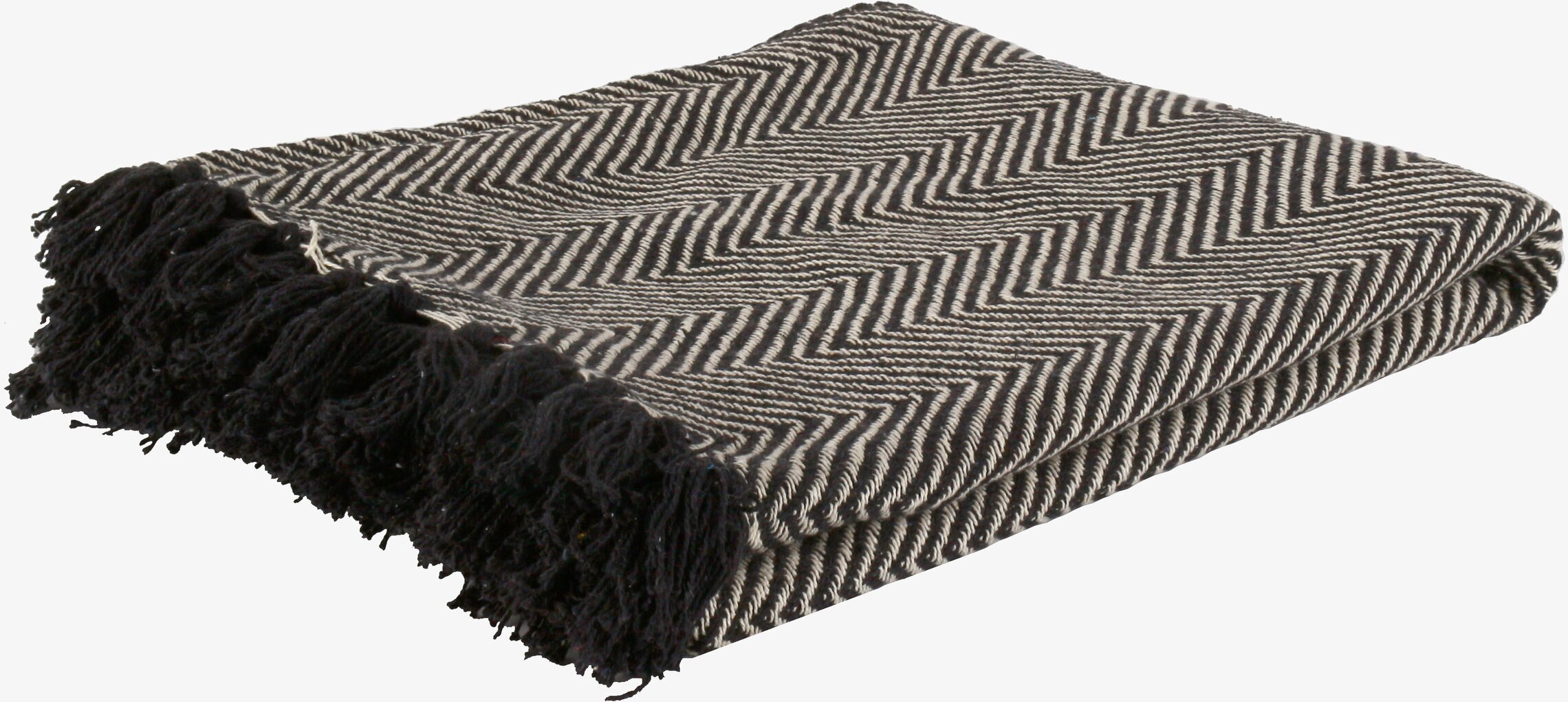 Bild av stilren pläd med zigzag-mönster och fransar