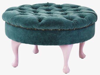Bild av rund sittpall i petrolblå sammet med nitar