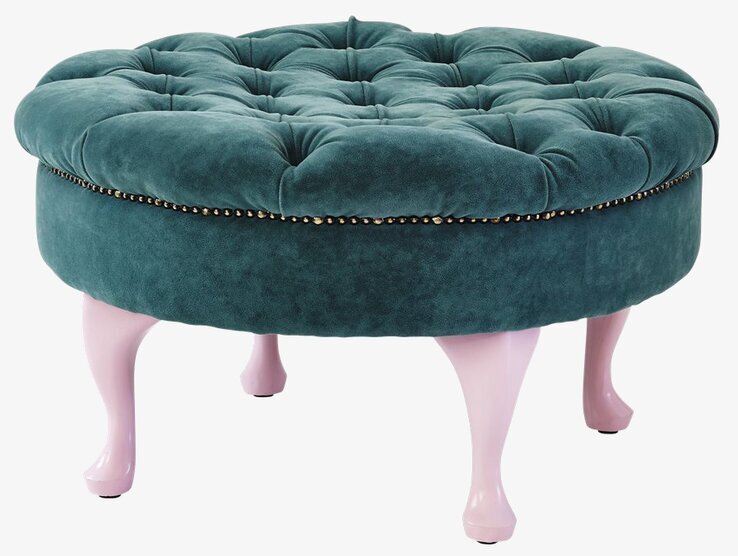 Bild av rund sittpall i petrolblå sammet med nitar