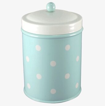 Bild av mintgrön plåtburk med vita prickar och knopp