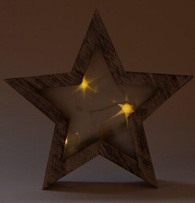 Foto av dekorativ stjärnformad LED-lampa i trälook