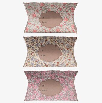 Bild av tre vintage-inspirerade presentförpackningar