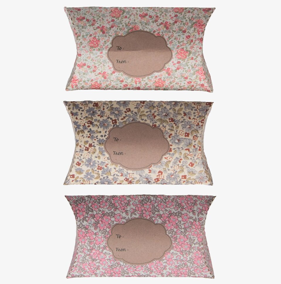 Bild av tre vintage-inspirerade presentförpackningar
