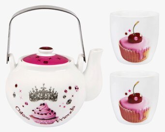 Bild av tekanna och muggar med cupcakesmotiv