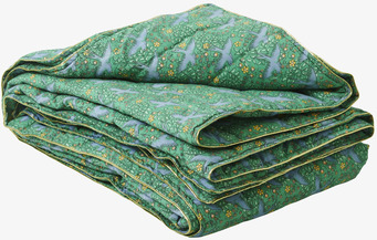 Bild av quilt med svalor och botaniskt mönster