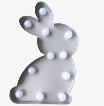 Foto av stilren LED-lampa formad som kanin i grått