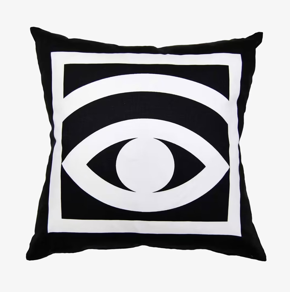 Bild av kuddfodral med stilrent ögonmotiv i svartvitt