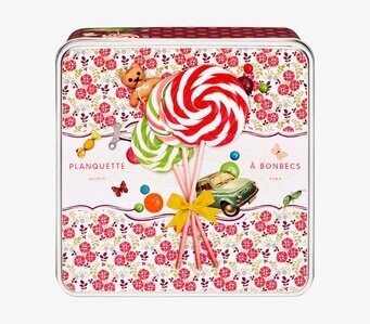 Bild av färgglad dekorativ plåtburk med sötsaker