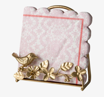 Bild av elegant tallrik- och servettställ i metall