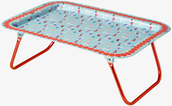 Bild av sängbricka med färgglada prickar och unik design