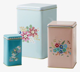 Bild av färgglada förvaringsburkar med blommönster