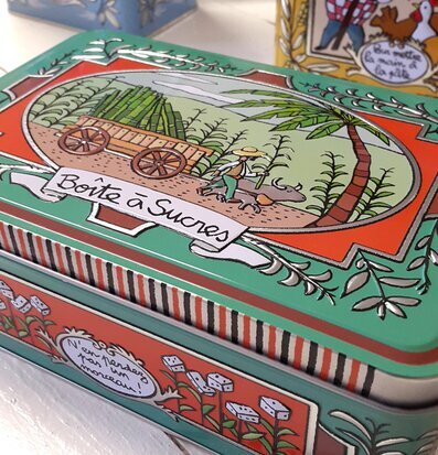 Bild av färgglad plåtburk med nostalgisk design