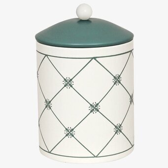 Bild av charmig plåtburk med tidlös design och funktion