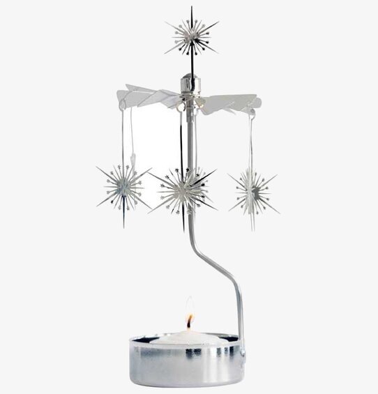 Foto av elegant änglaspel med roterande stjärnor