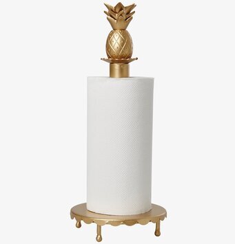 Foto av elegant pappershållare i guld med ananasdesign