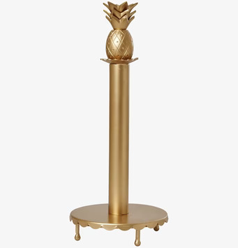 Bild av gyllene pappershållare i form av en ananas