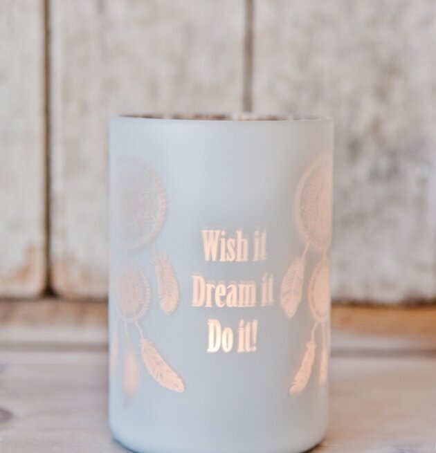 Bild av vit drömfångare med inspirerande budskap