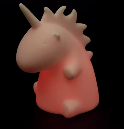 Bild av enhörningslampa som sprider magiskt sken