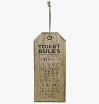 Bild av rustik tavla med humoristiska toalettregler