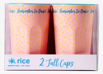 Bild av två färgglada och glädjefyllda latte-muggar