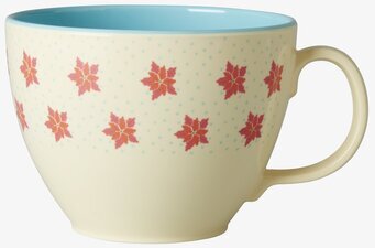 Bild av stilren jumbomugg med blommönster och prickar