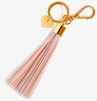 Bild av elegant nyckelring med reflextofs i nude/guld