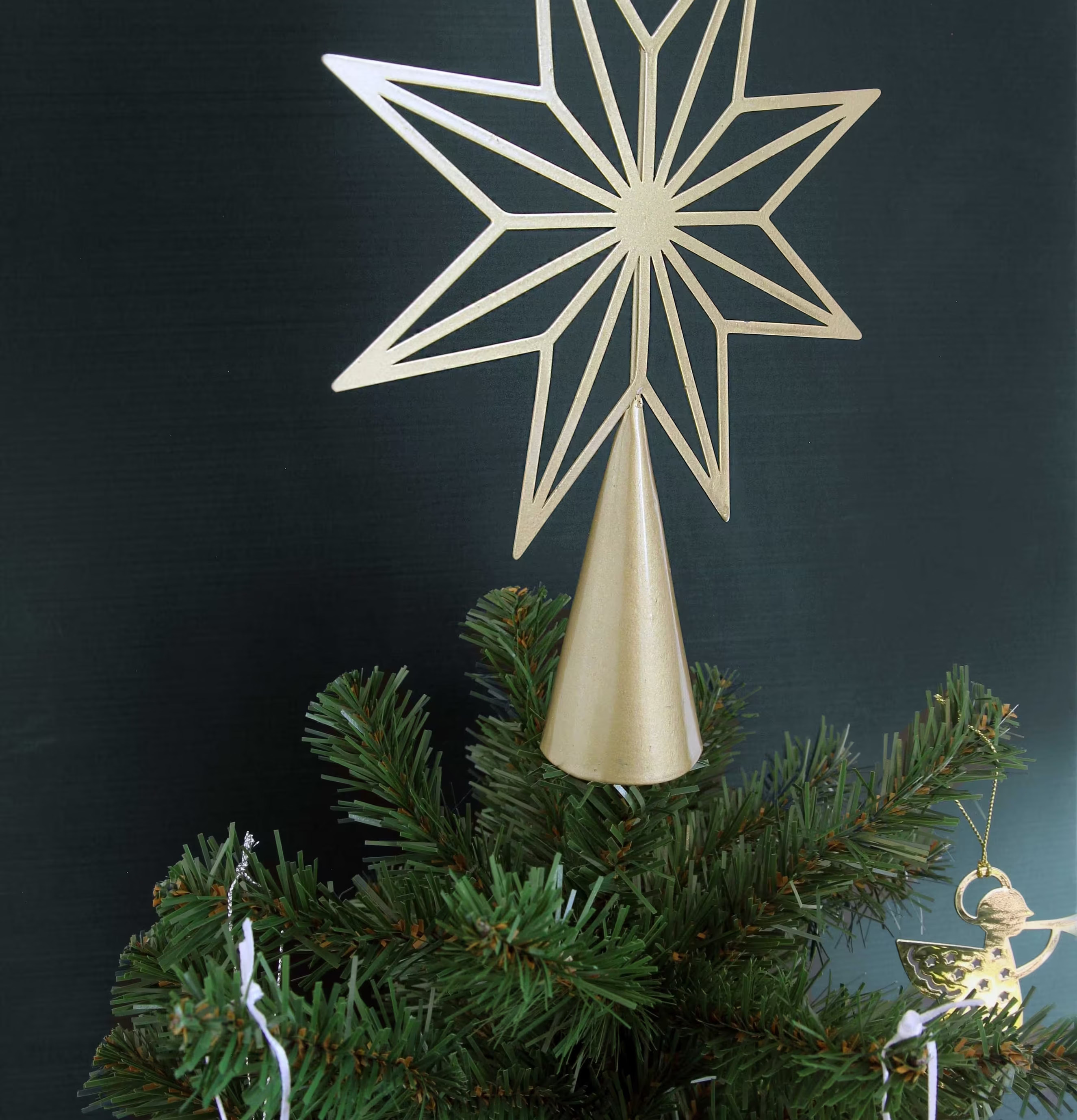 Toppstjärna Guld från Pluto Produkter på julgran