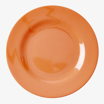 Bild av livfull neonorange assiett med modern design