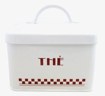 Bild av charmig plåtburk för teförvaring i köket