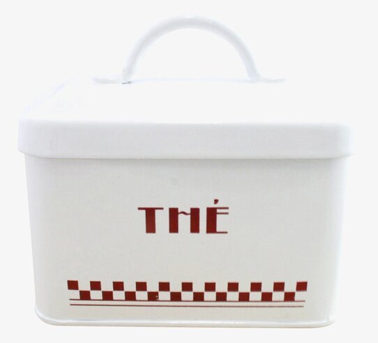 Bild av charmig plåtburk för teförvaring i köket