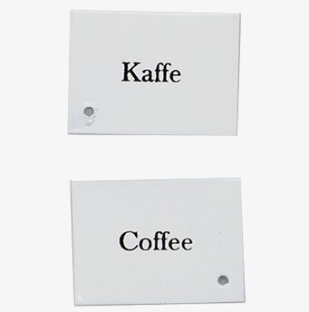 Bild av stilrena etiketter för kaffe på svenska och engelska